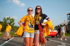 Two female students in gameday attire
