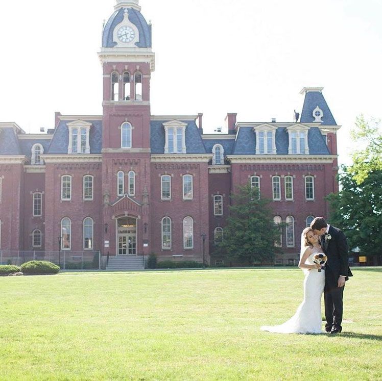 Bride and groom in front of Woodburn Hall