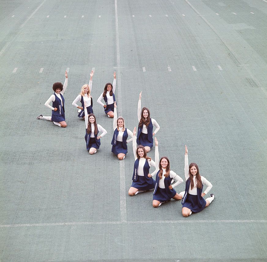 Cheerleaders group photo on Mountaineer Field