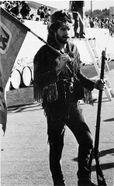 Ed Cokeley with flag and musket